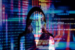 Lady standing of the computer screen, showing Quantum Computing concept 