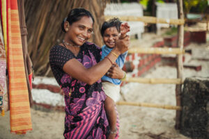 Indian women with a little baby in Kamarchhath Festival 